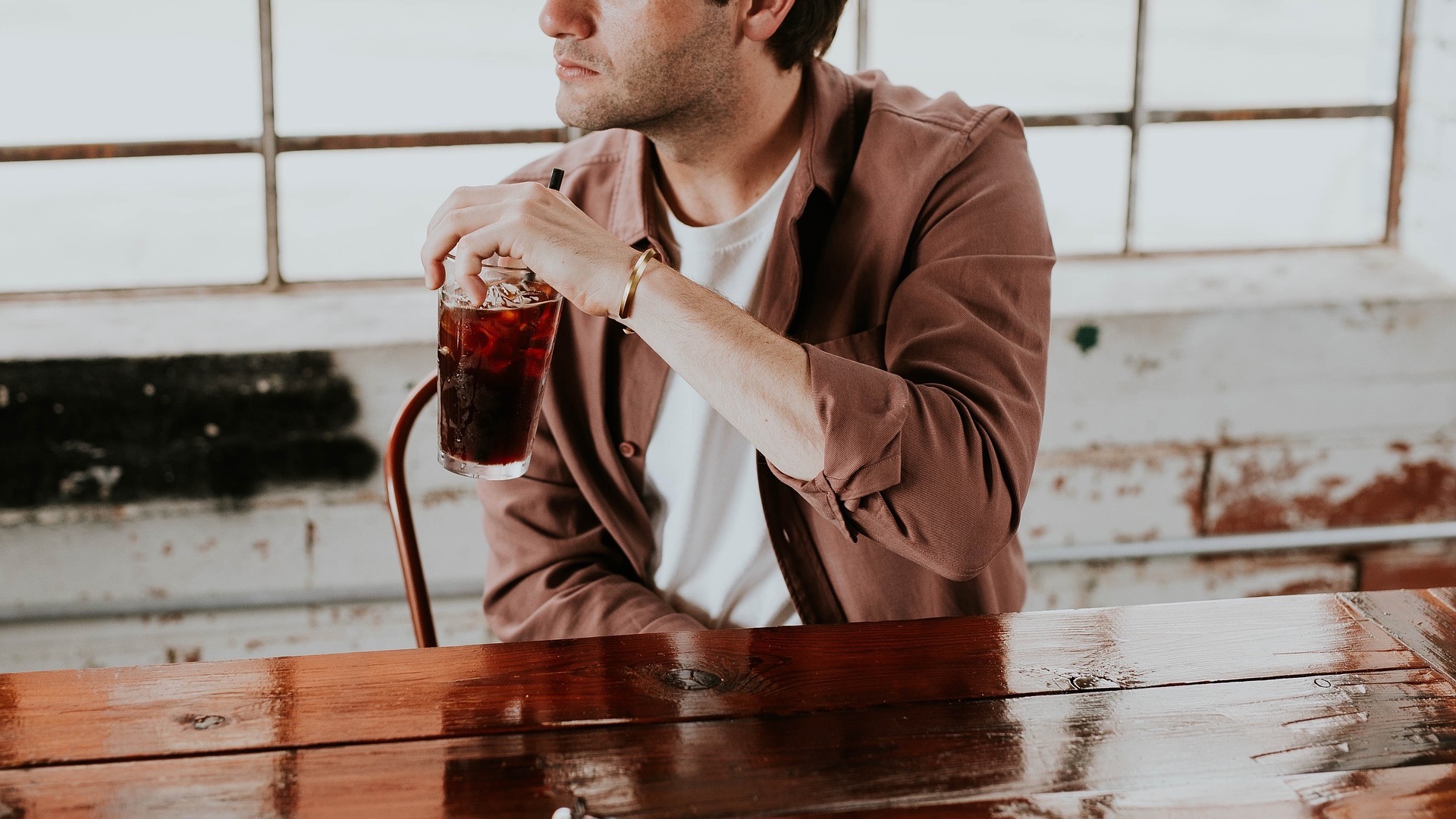 A single guy in a restaurant.